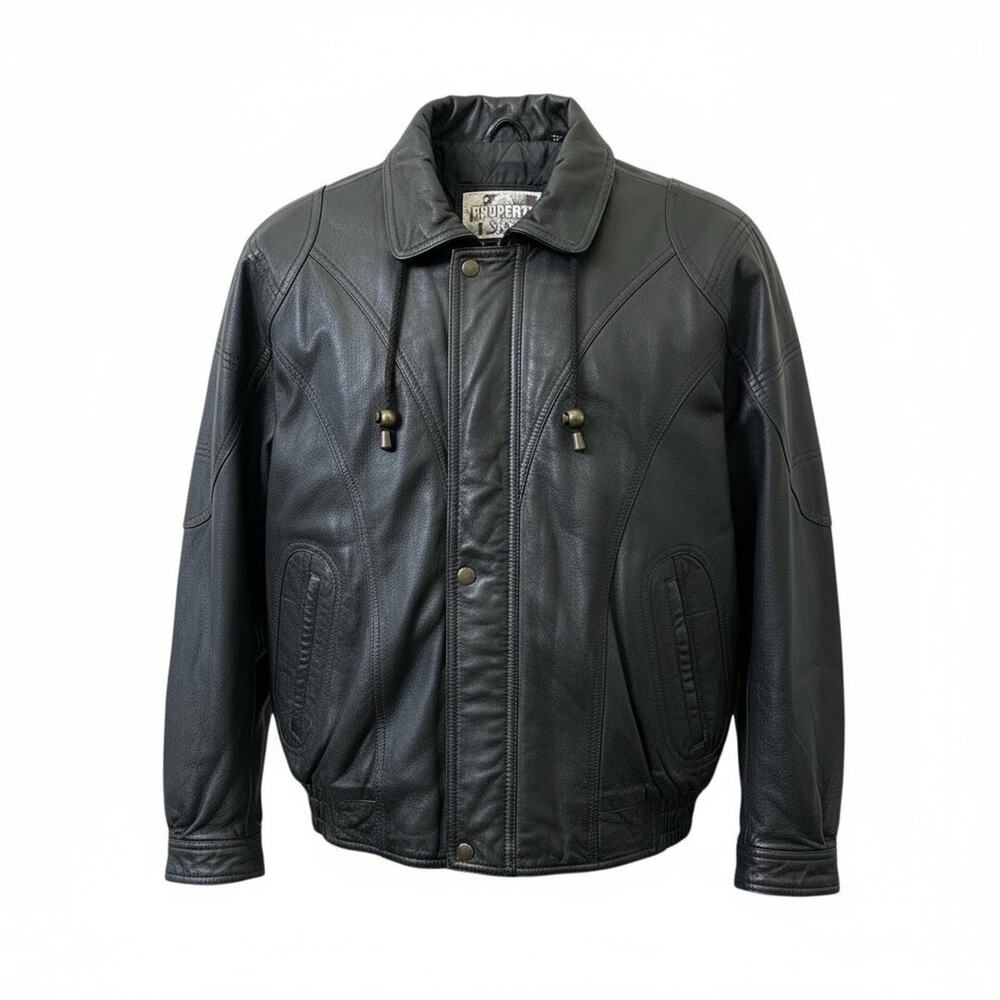 Property vintage black leather bomber jacket from the 1990s with a Size M